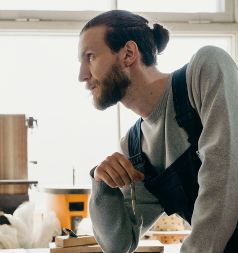 A man working in a ceramic studio