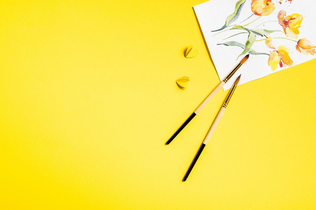 Yellow painting with brushes for Continuing Education and OLLI press release.