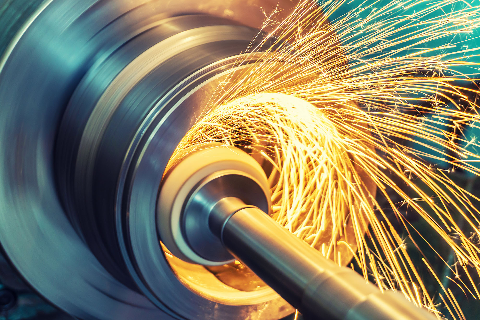 Image of rod in pipe with sparks flying for the Manufacturing Day release.