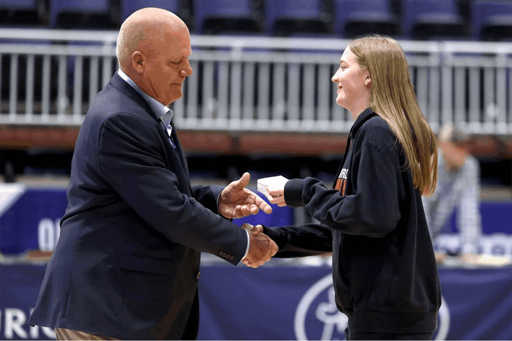 Photo of Andi Schissler receiving NJCAA All-Tounrnament Honors April 1, 2025.