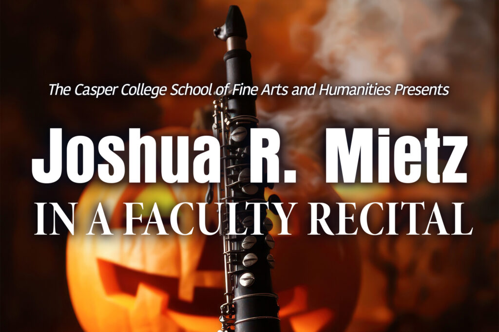 Image of a clarinet with a carved pumpkin in the background for a press release on a faculty recital.
