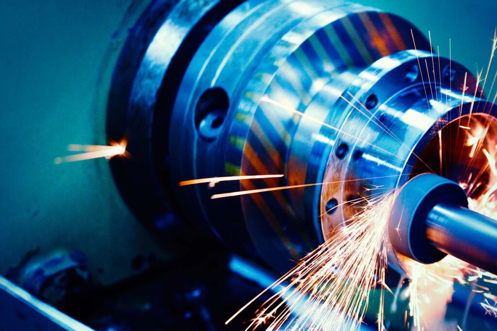 Close-up of industrial machining equipment throwing bright sparks. machine tool technology