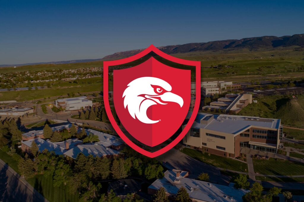 Aerial view of a college campus with a red Thunderbird shield overlay.