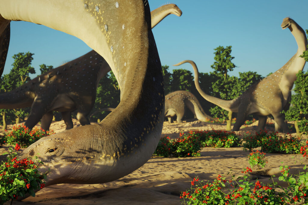 Digital artwork of a Late Cretaceous landscape featuring a herd of long-necked dinosaurs. The Tate Geological Museum will host a talk by Russell Hawley on March 4 to discuss how such ancient worlds are reconstructed from fossil evidence.